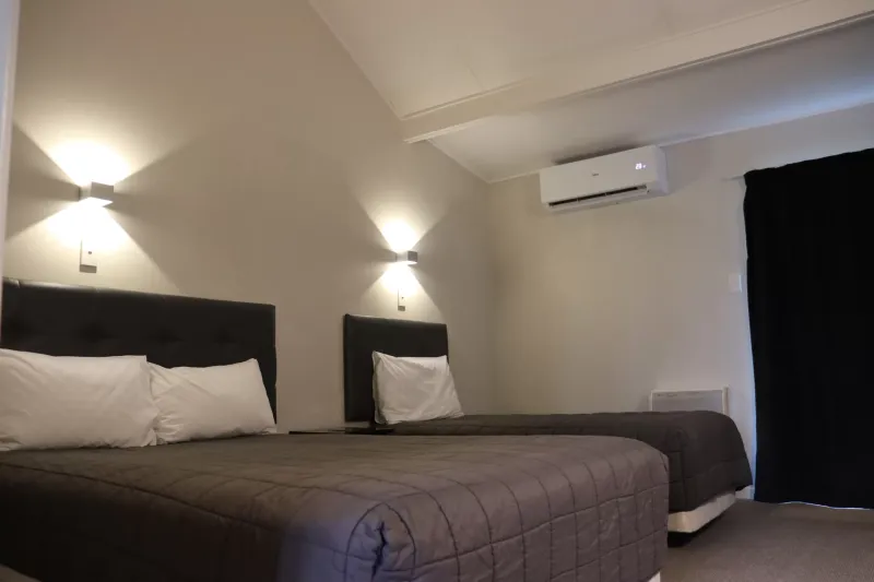 Moody evening ambience in a studio room at The Furlong Motel, Hawera